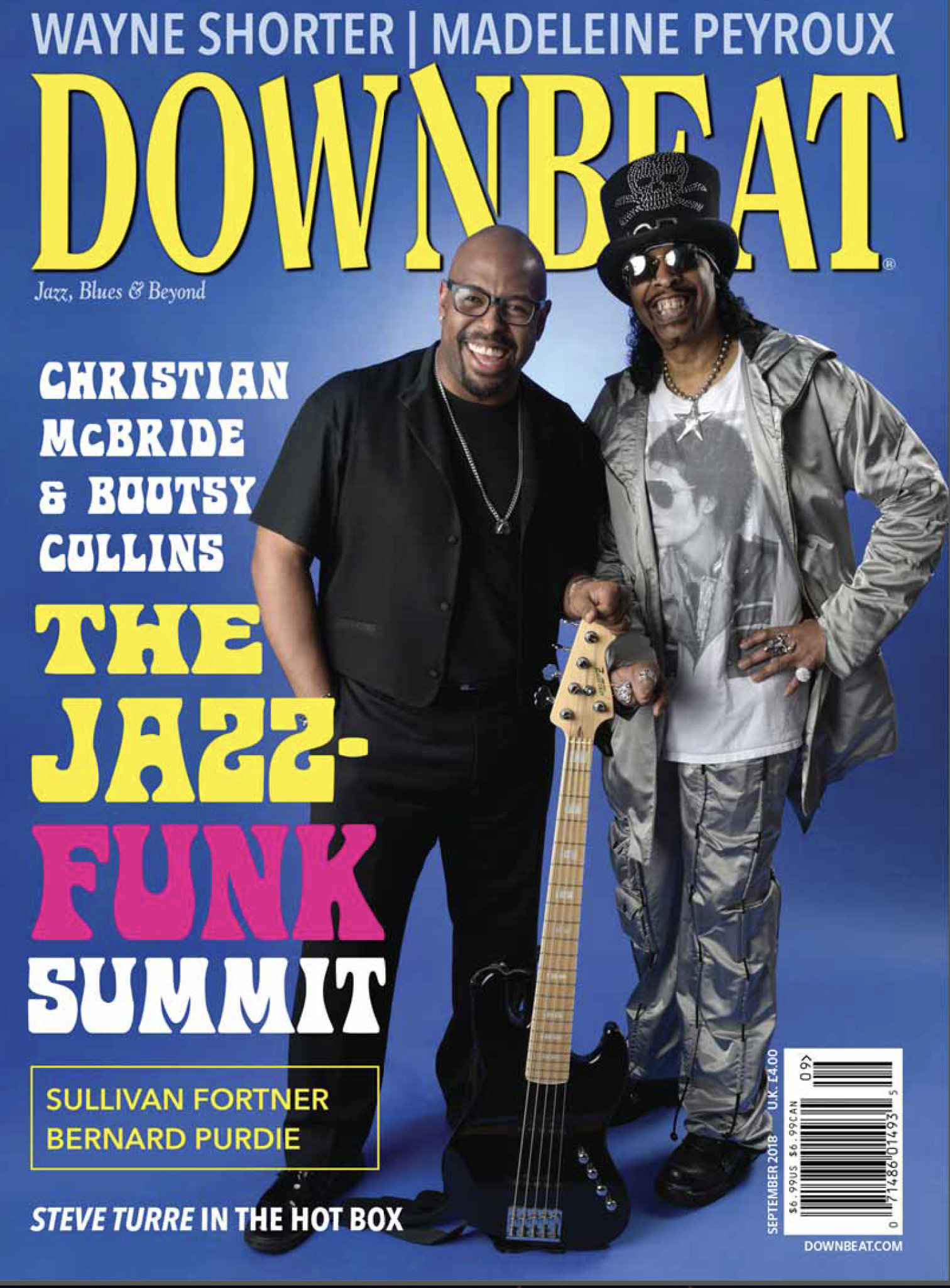 A magazine cover with two men holding guitars.